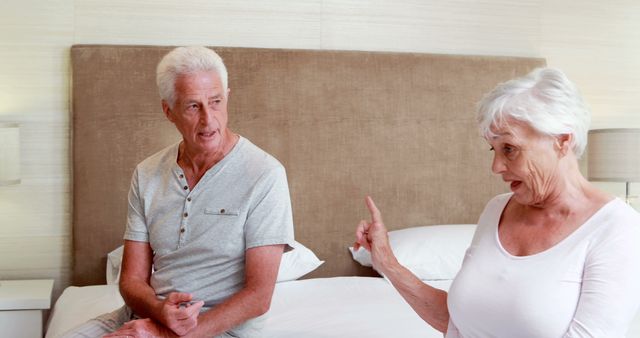 This image is ideal for use in articles or blog posts about communication in relationships, elderly lifestyle topics, or issues facing senior couples. It can also be utilized in advertisements or brochures for retirement homes, relationship counseling, or family health and wellness programs.
