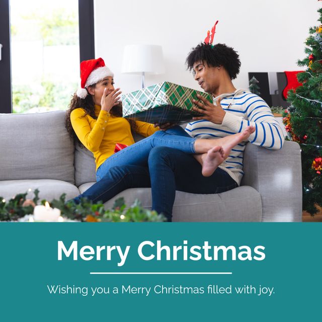Composite of diverse boyfriend giving christmas present to girlfriend and merry christmas text. Wishing you a merry christmas filled with joy, love, together, surprise, holiday, celebrate, festive.