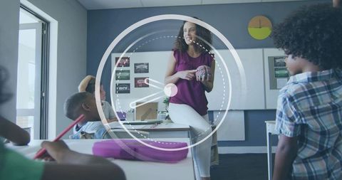 Teacher teaching neuroscience holding brain model in classroom with circular timer overlay