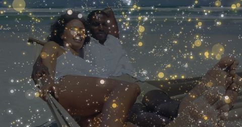 Relaxing Couple Under Magical Sky at Beach