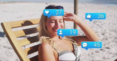 Woman Enjoying Beach with Social Media Notifications in Summer