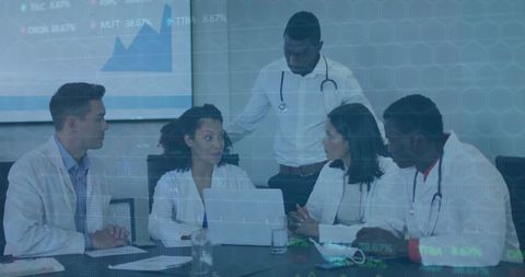 Medical Team Discussing Data Trends in Healthcare Meeting