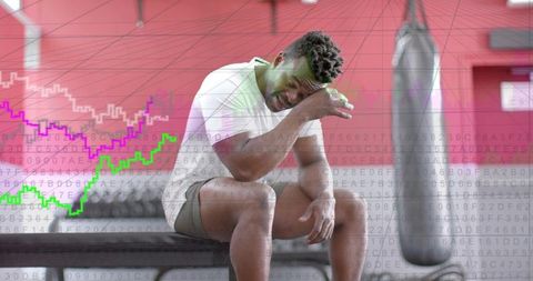 Gym athlete wiping sweat on bench with data overlay, training recovery concept
