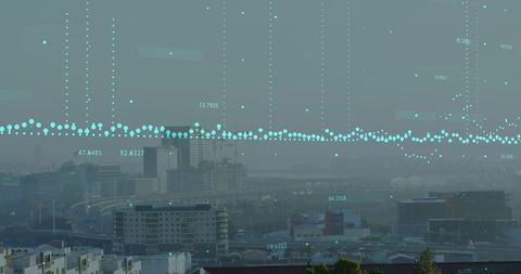Data Points Overlaying Modern Urban Cityscape at High Angle View