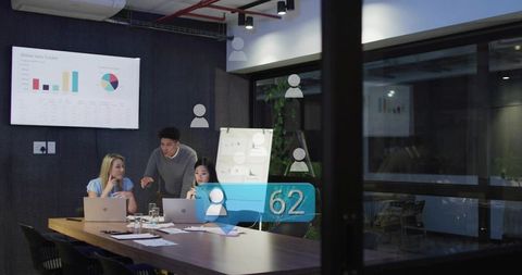 Team Collaborating Over Data Using Augmented Reality Analytics in Modern Conference Room