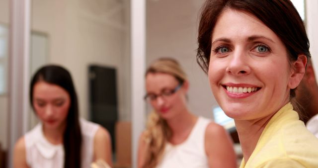 Confident Businesswoman Smiling in Professional Meeting - Download Free Stock Images Pikwizard.com