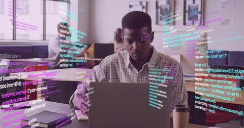 Software developer coding in office collaborating with team