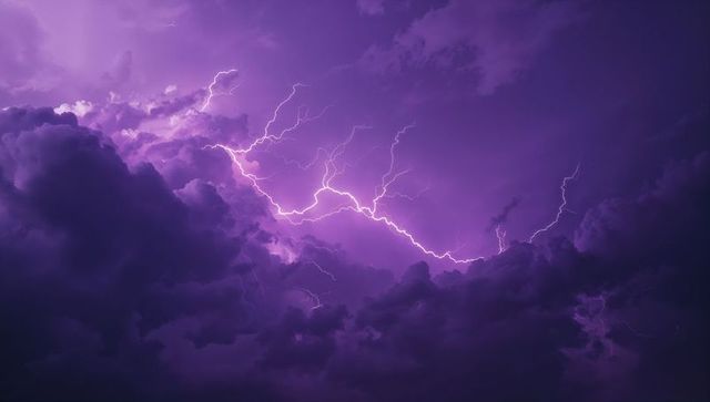 Vibrant Lightning Through Dramatic Purple Stormy Sky