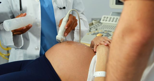 Doctor Performing Ultrasound on Pregnant Woman’s Belly - Download Free Stock Images Pikwizard.com