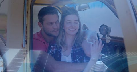 Couple Enjoying Road Trip with Futuristic Digital Overlay