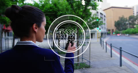 Businesswoman Using Augmented Reality in Urban Setting