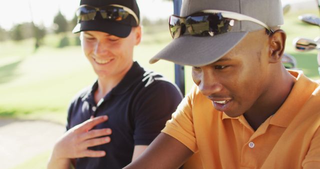 Image of happy diverse male friends driving cart on golf field - Download Free Stock Photos Pikwizard.com