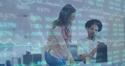 Business Team Analyzing Digital Stock Market Data in Modern Office