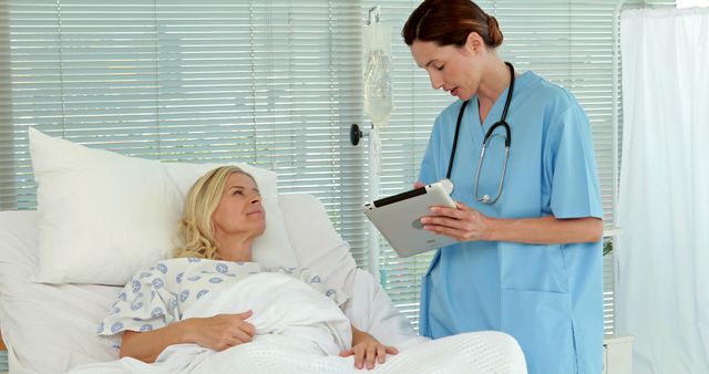 Nurse caring for hospitalized patient in hospital room - Download Free Stock Images Pikwizard.com