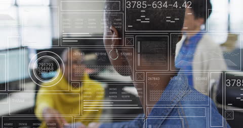 Tech Integration with Diverse Team Analyzing Data in Office