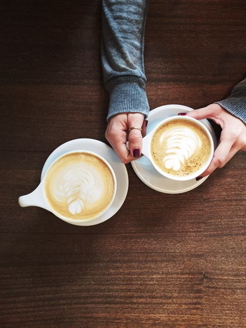 People Enjoying Specialty Coffee with Latte Art at Cozy Café - Download Free Stock Images Pikwizard.com