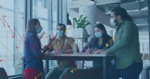 Diverse Coworkers Analyzing Financial Data During Pandemic