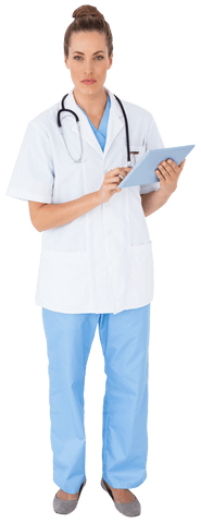 Modern Nurse in Blue Scrubs Using Tablet on Transparent Background - Download Free Stock Videos Pikwizard.com