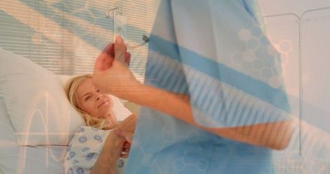 Nurse Adjusting IV Bag for Hospitalized Patient with Care