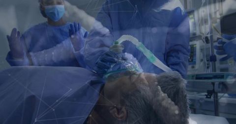 Critical care team stabilizing patient in intensive care unit