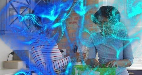 Mother and daughter cooking together with green bowl and teal digital overlay