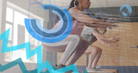 Diverse women box jumping with data overlay in gym