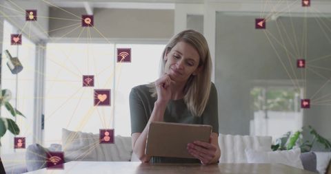 woman exploring digital network interfaces on tablet - Download Free Stock Images Pikwizard.com