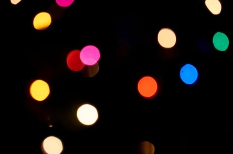 Vibrant Colorful Bokeh Lights Glowing in Darkness