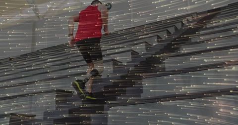 Athlete Sprinting Up Stadium Stairs with Futuristic Effects