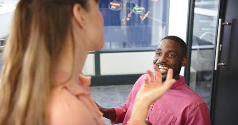 Business Colleagues Engaging in Joyful Conversation - Download Free Stock Images Pikwizard.com
