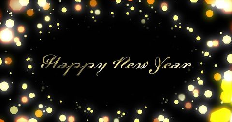 Happy new year text with glowing light spots on black background