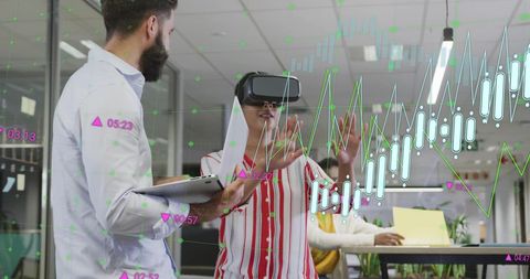Diverse Team Engaging with Virtual Reality and Financial Data in Modern Office
