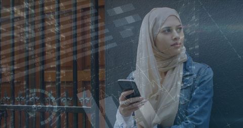 Middle eastern woman engaged with finance and technology