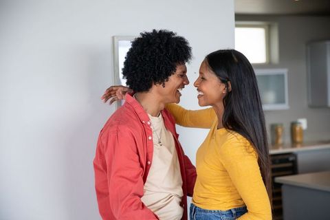 Diverse Couple Sharing Moment in Modern Kitchen