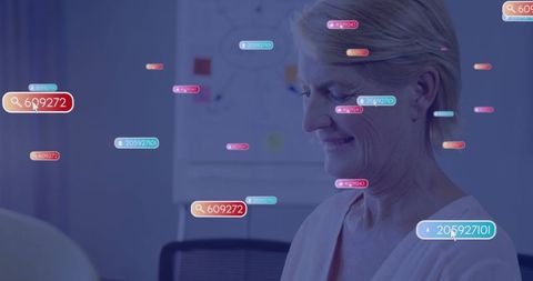 Senior businesswoman engaging in interactive data analysis