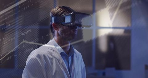 Scientist testing vr headset with holographic data overlays in laboratory