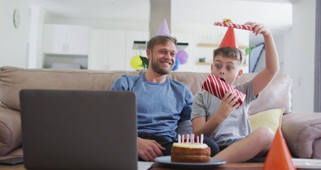 Father and Son Celebrating Birthday with Online Connection - Download Free Stock Images Pikwizard.com