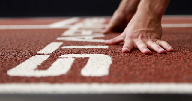 Hands of Athlete on Starting Line Ready to Run Race - Download Free Stock Images Pikwizard.com