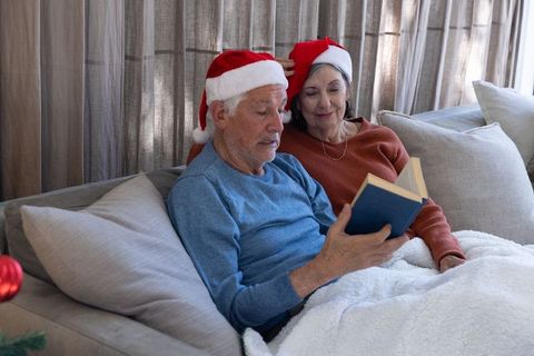 Senior Couple Relaxing with Seasonal Traditions During Holidays