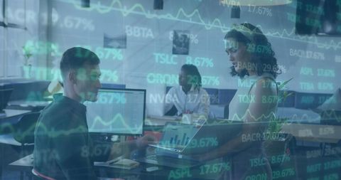 Colleagues Discussing Strategies with Projected Stock Market Data - Download Free Stock Images Pikwizard.com
