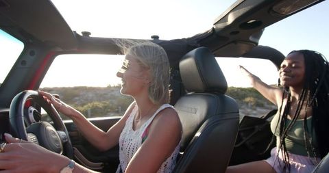 Friends Enjoying Convertible Road Trip Freedom and Joy - Download Free Stock Images Pikwizard.com