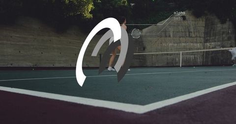 Young tennis player swinging racket on outdoor court