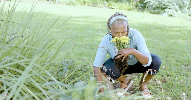 Senior Woman Gardening and Smelling Fresh Flowers in Backyard - Download Free Stock Images Pikwizard.com