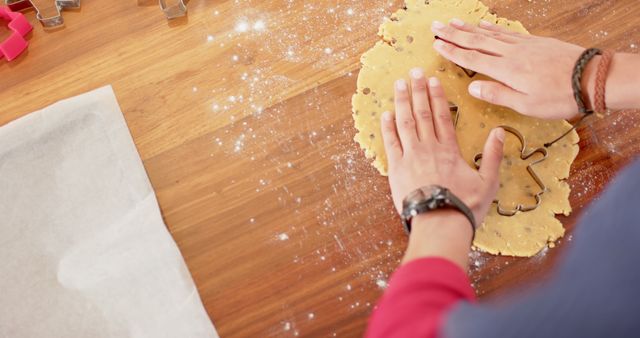Person Making Cutout Cookies on Wooden Surface - Download Free Stock Images Pikwizard.com