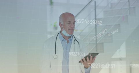 Senior Male Doctor Analyzing Data on Digital Tablet - Download Free Stock Images Pikwizard.com