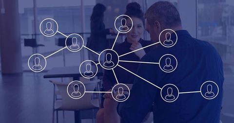 Business Networking Discussion with Digital Network Overlay in Modern Office Lobby