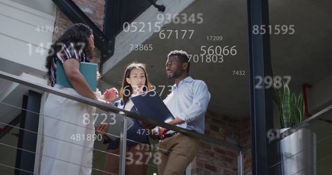 Diverse Business Team Discussing Data Analysis Concepts