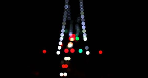 Vibrant Nighttime Bokeh of City Road Lights