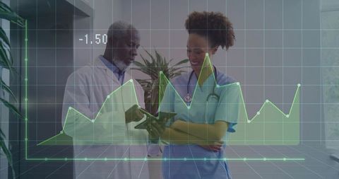 Doctor and Nurse Analyzing Healthcare Data on Tablet