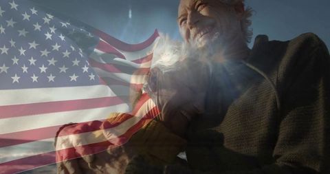 Senior Couple Embracing with American Flag Overlay